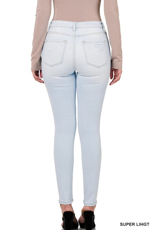 Super Destroyed Light Wash Skinny Jean